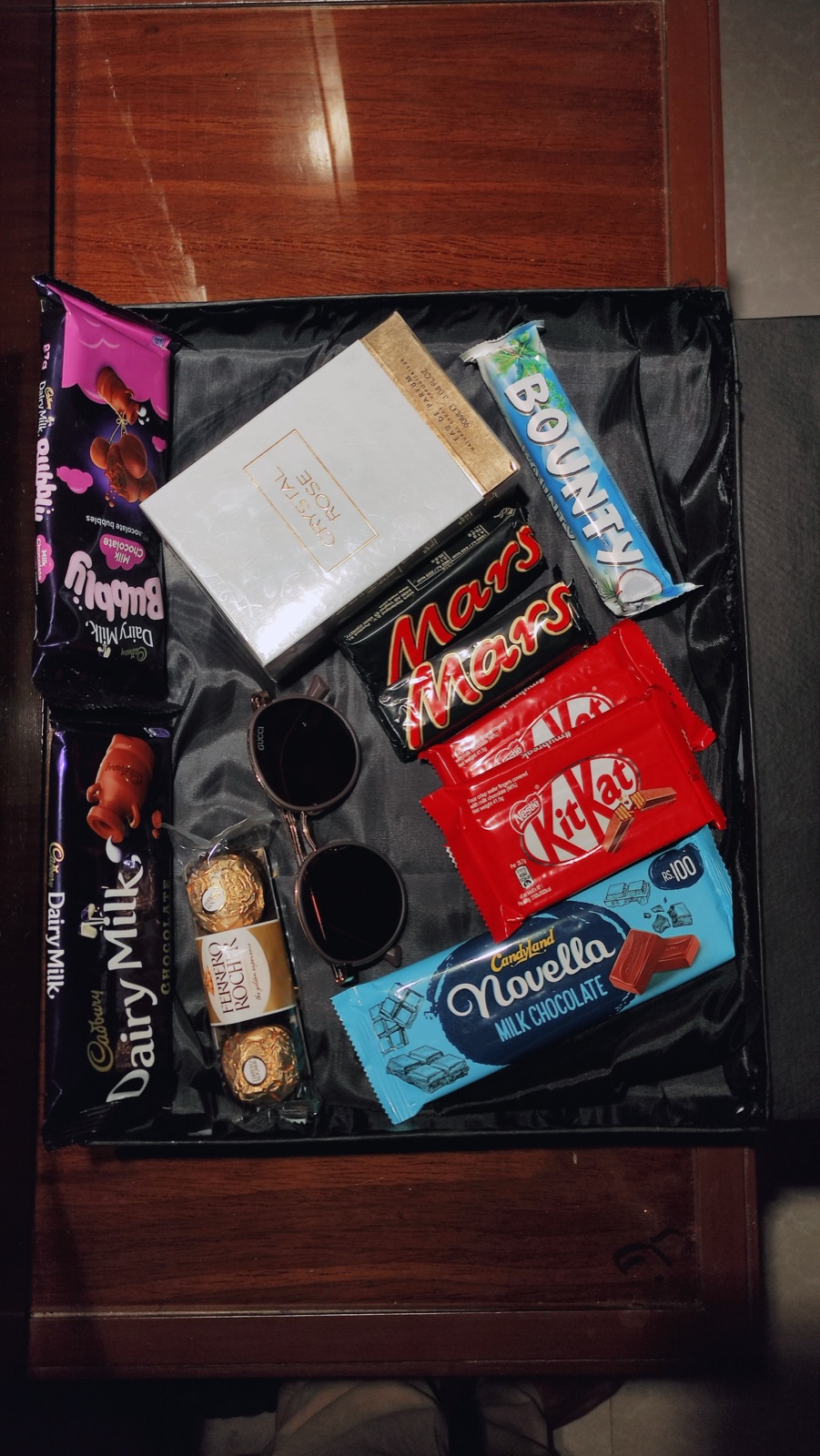 Chocolates and wireless earbuds gift box